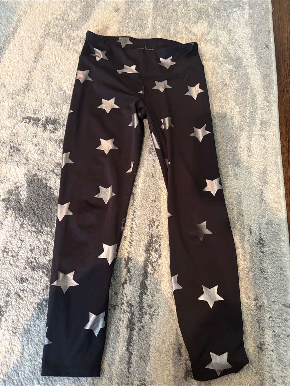 Nanette Lepore Black leggings with Silver Stars size small like new!